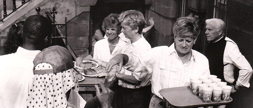 Volunteers serving meals